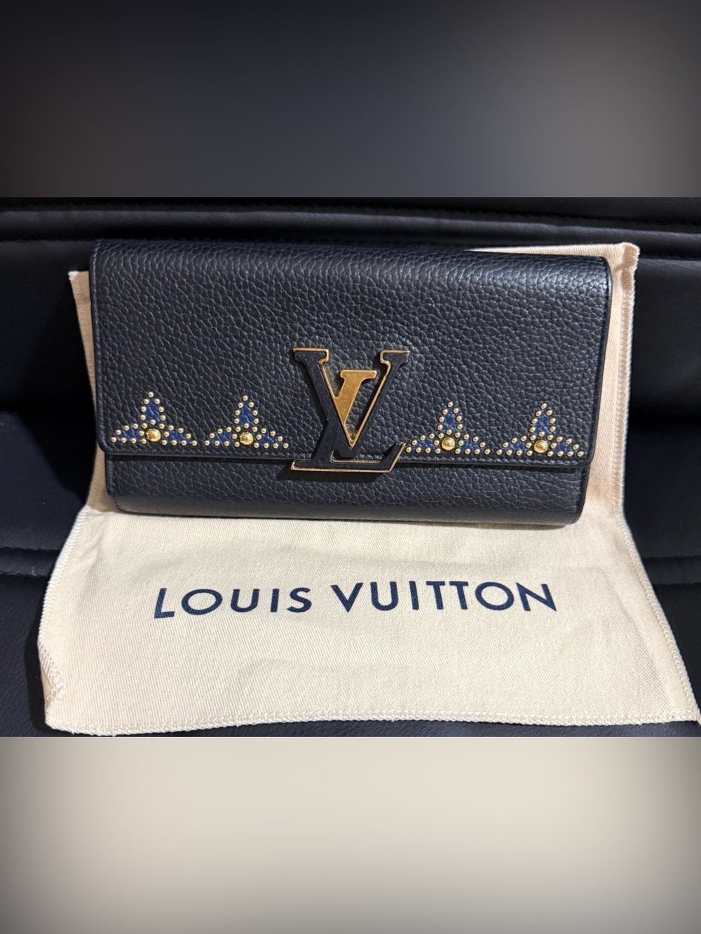 Louis Vuitton Dark Navy Pebbled Leather Clutch with Gold Accents